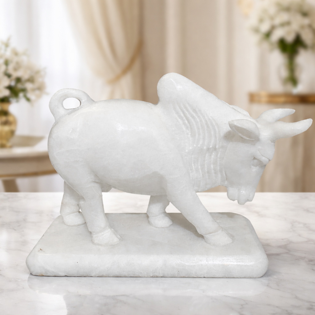 Handcrafted white marble bull figurine symbolising strength and prosperity in home décor