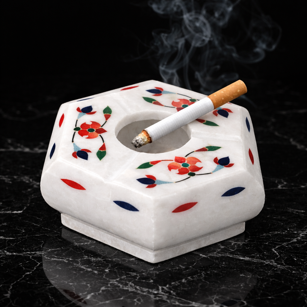 Luxury white marble ashtray with red and blue floral inlay design on black marble background