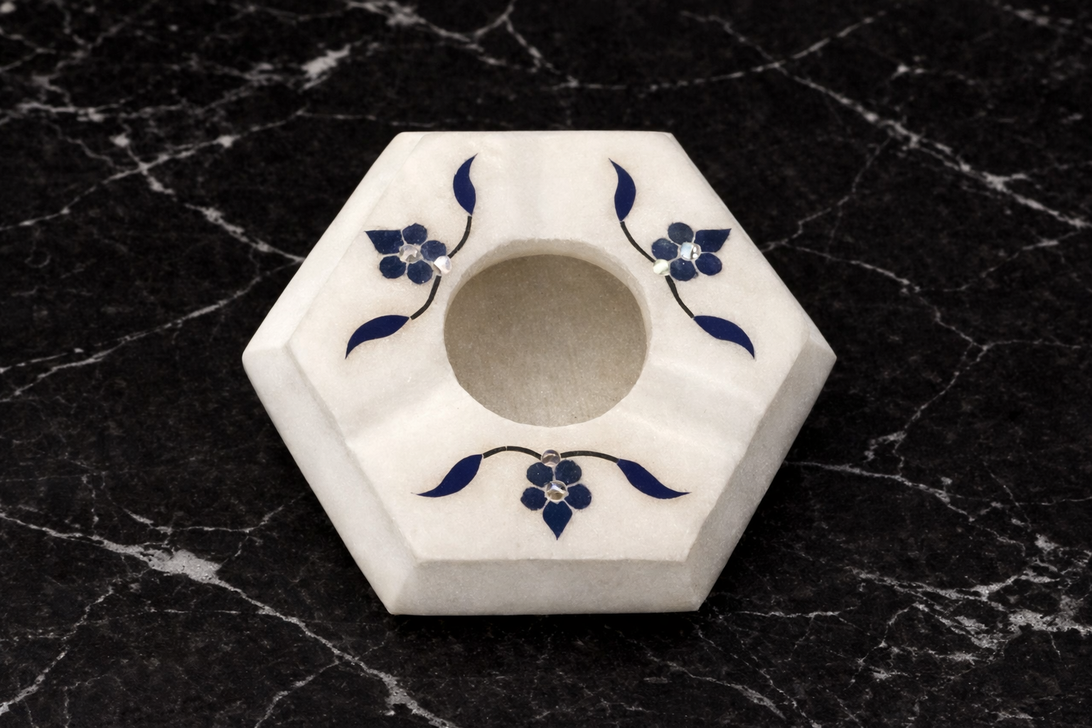 Luxury marble ashtray with blue floral inlay pattern on marble surface NZ