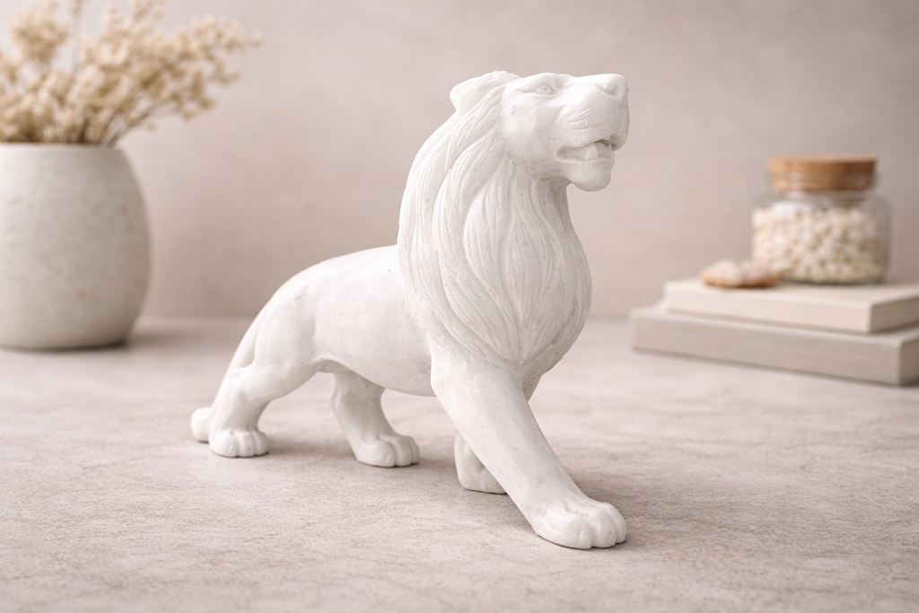 Decorative marble lion sculpture used as symmetrical home décor accent