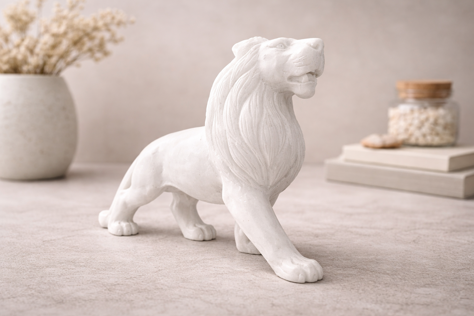 Decorative marble lion sculpture used as symmetrical home décor accent