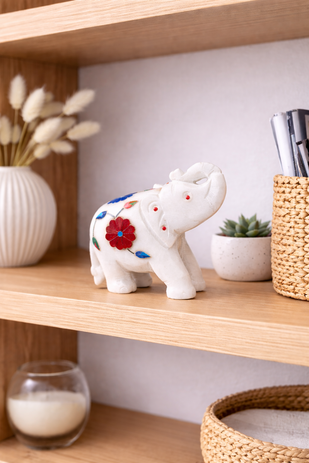 0.313 kg decorative marble elephant figurines with floral inlay on wooden table