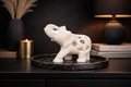 hand carved white marble elephant sculpture with elephant inside design on black marble tray
