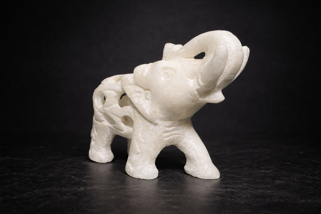 intricate white marble elephant sculpture artisan carved animal statue