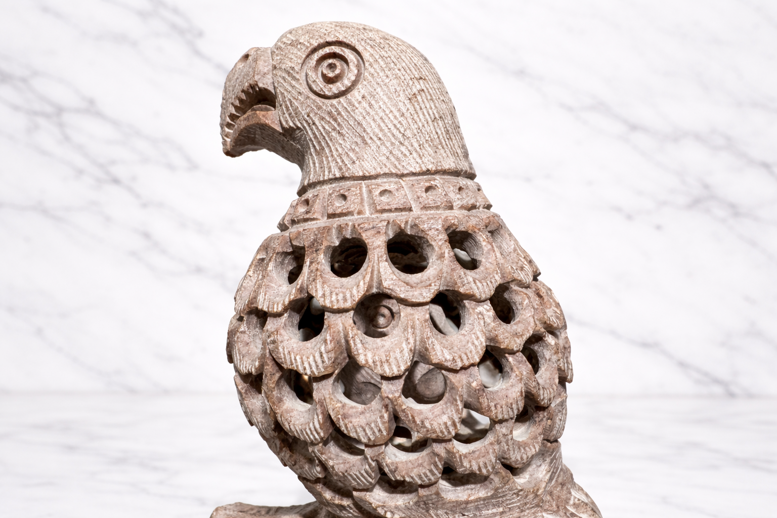0.169 kg Hand-carved soapstone parrot sculpture with intricate openwork design