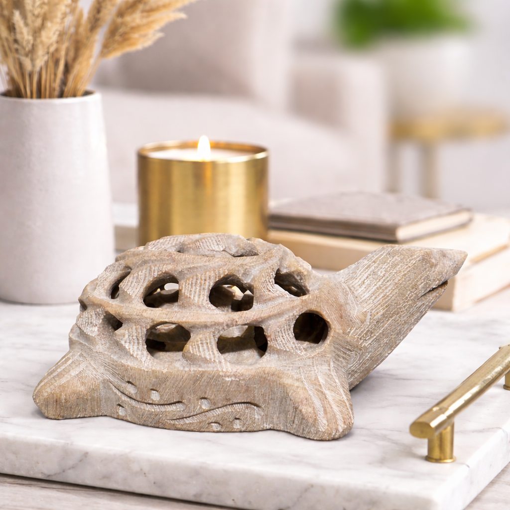 Artisan marble turtle sculpture featuring detailed openwork shell and textured stone finish
