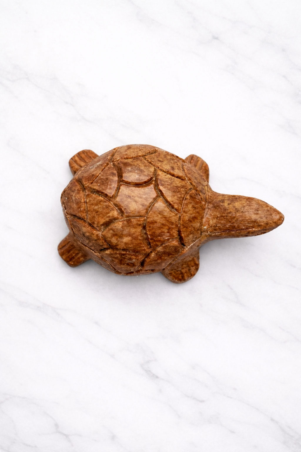 Solid soapstone turtle sculpture with smooth polished surface