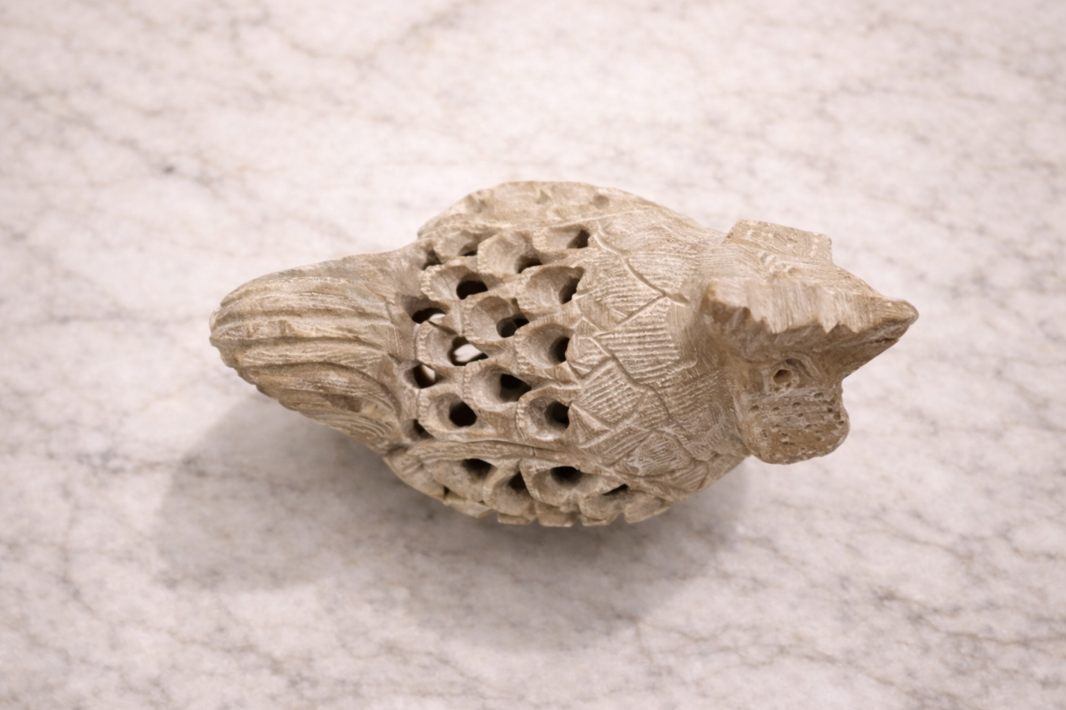 Top view of Soapstone rooster decorative sculpture with intricate openwork carving