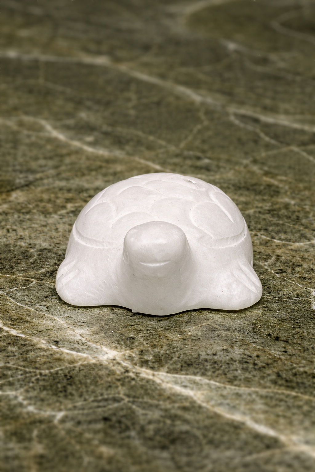 0.055 kg front view of white marble mini turtle figurine showing carved shell detail on stone surface