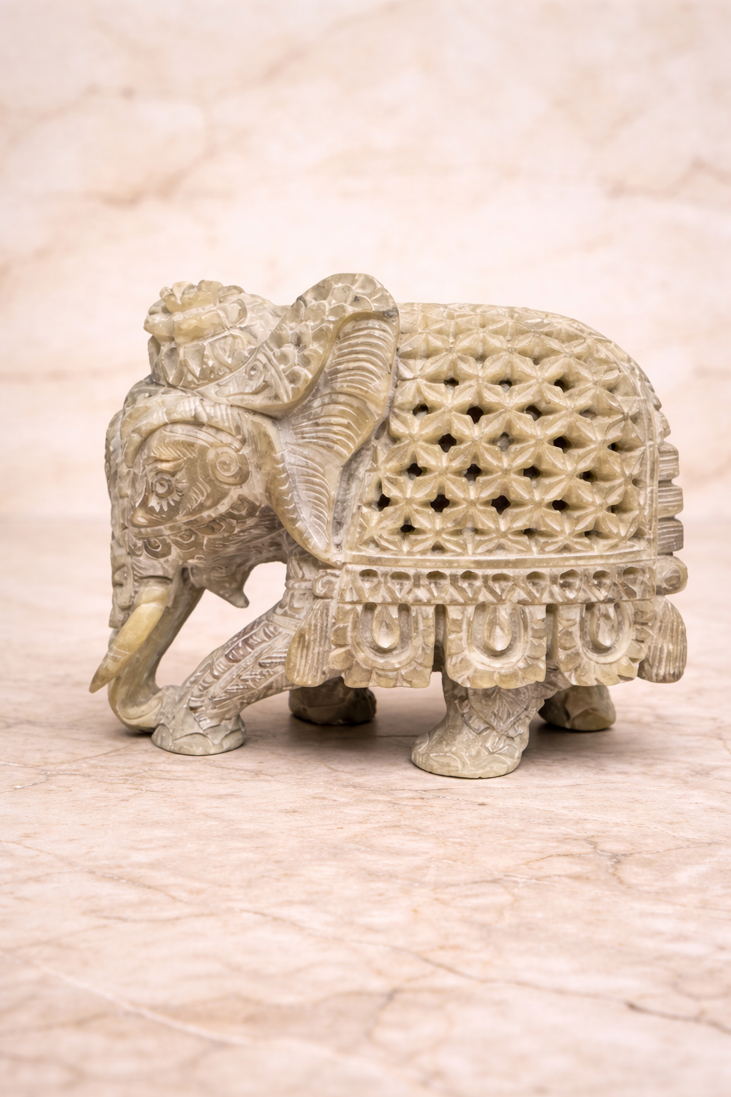 Natural soapstone elephant figurine with detailed carving