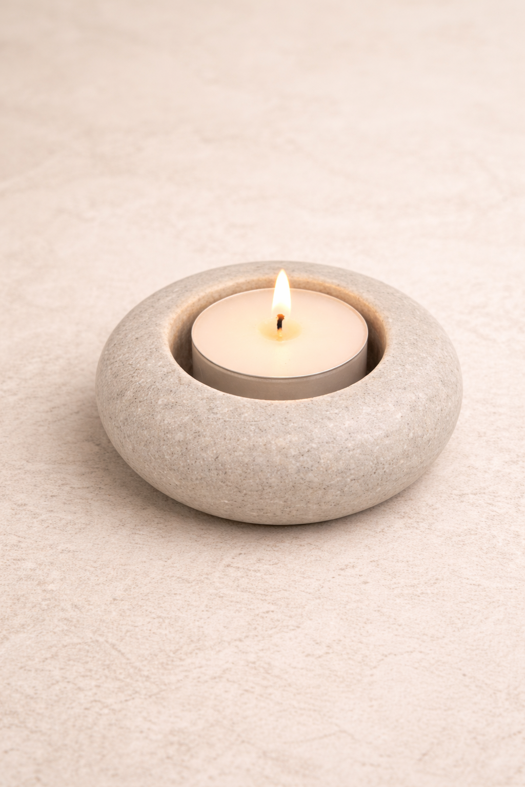 White marble bowl used as tealight candle holder natural stone decor
