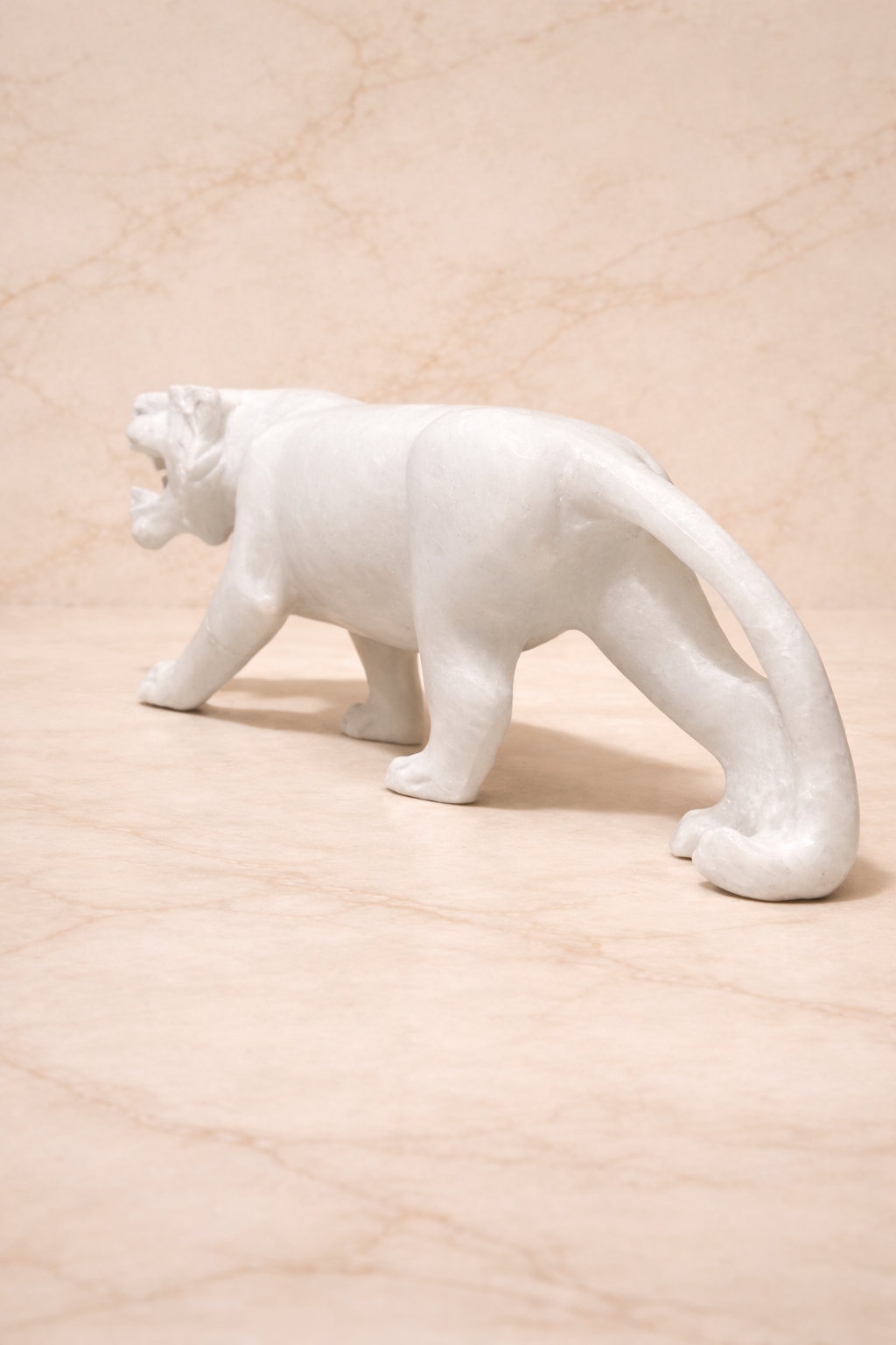 Rare view for a White marble tiger sculpture with roaring expression