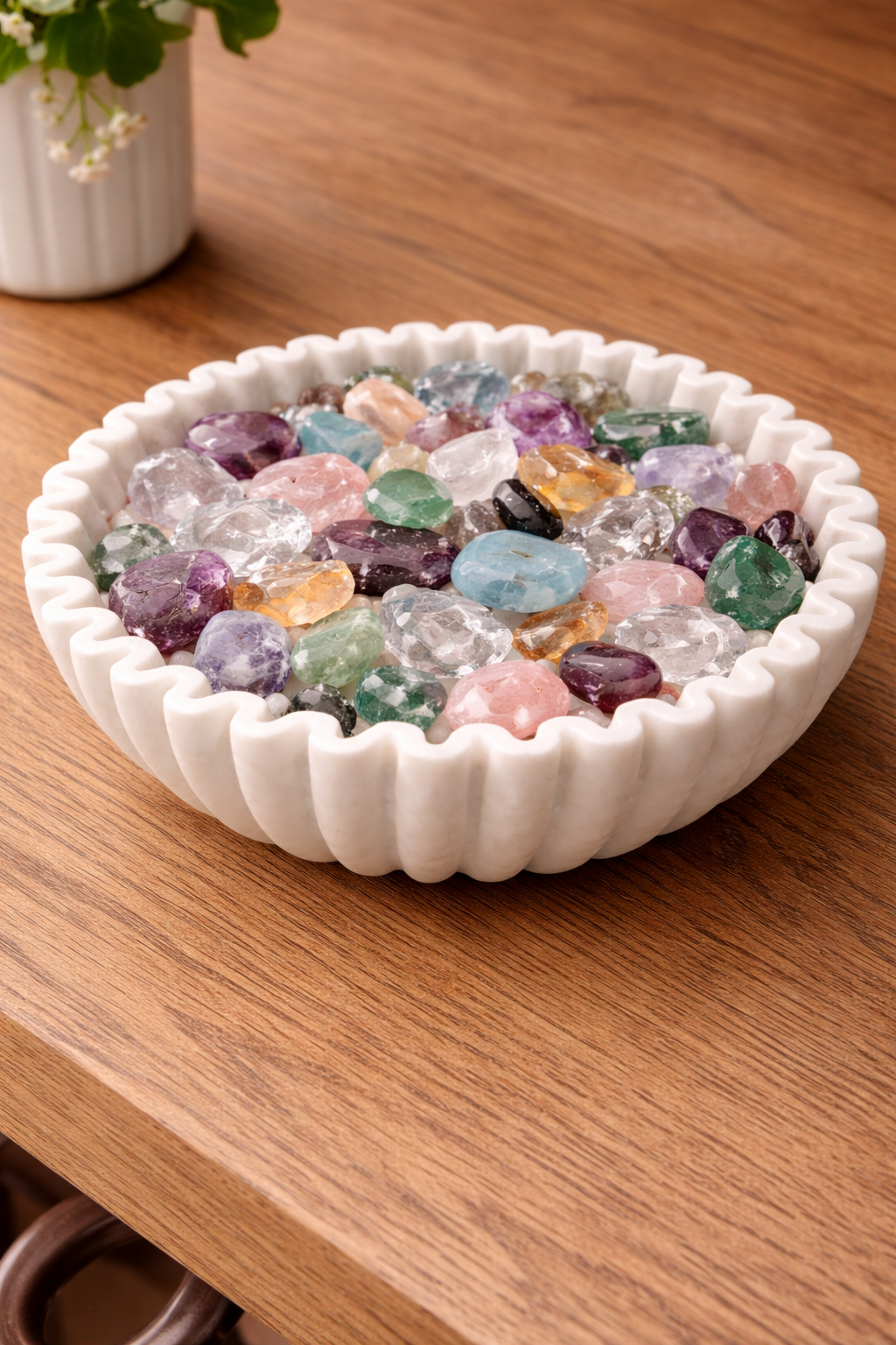 White marble decorative bowl filled with pebbles on wooden surface, natural stone centrepiece décor NZ