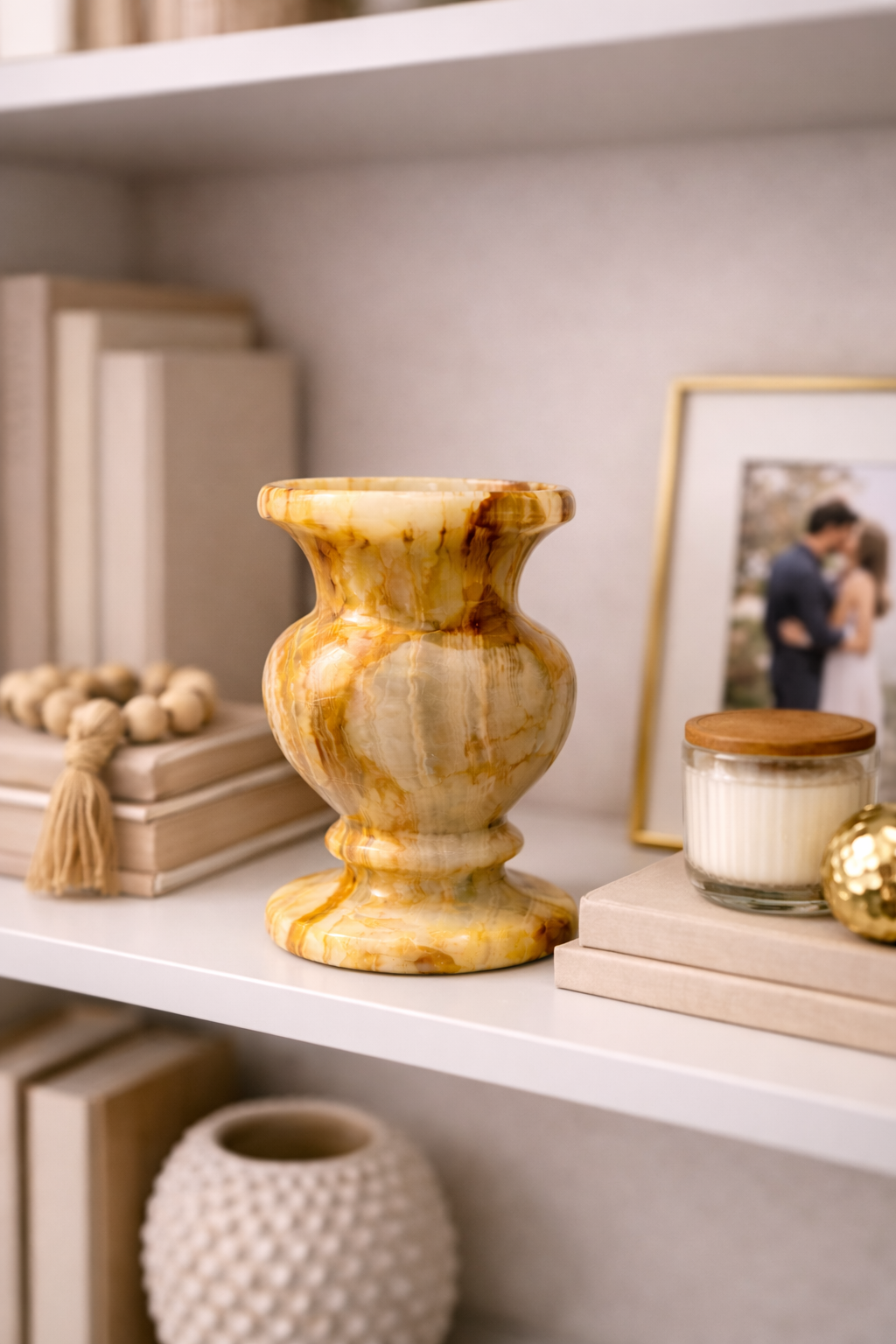 Natural onyx vase styled on decor shelf with warm lighting, luxury stone home accent NZ.