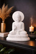 Marble Buddha statue NZ styled in a peaceful meditation space for wellness and mindfulness.