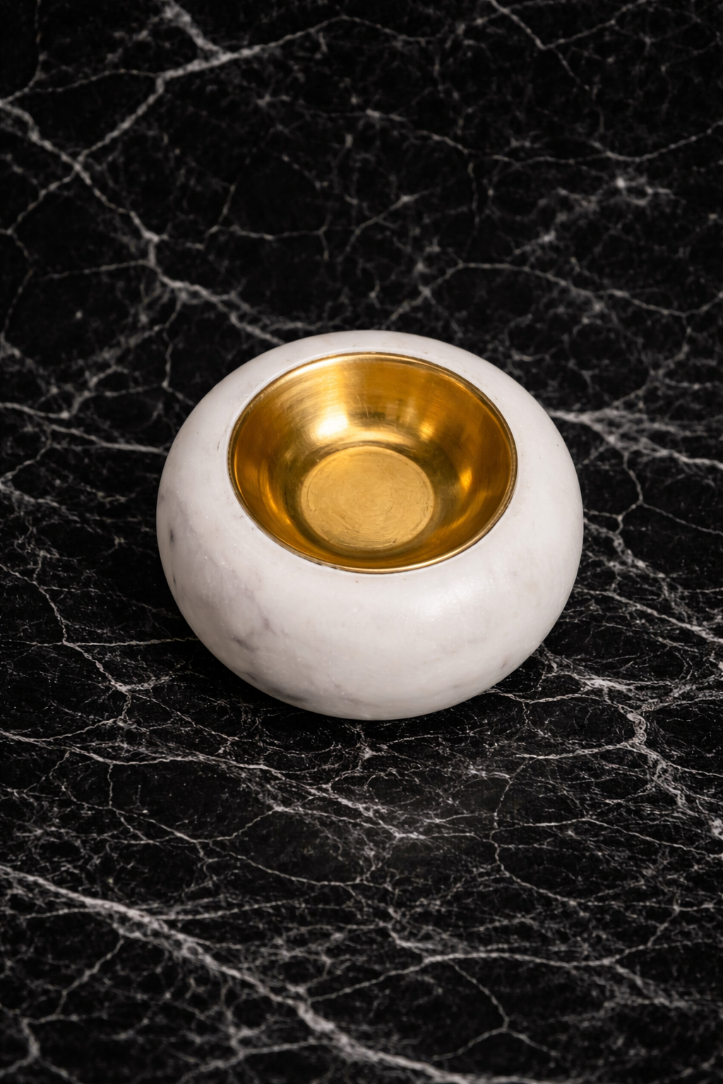 Round white marble tealight holder with brass on black marble, luxury home décor NZ