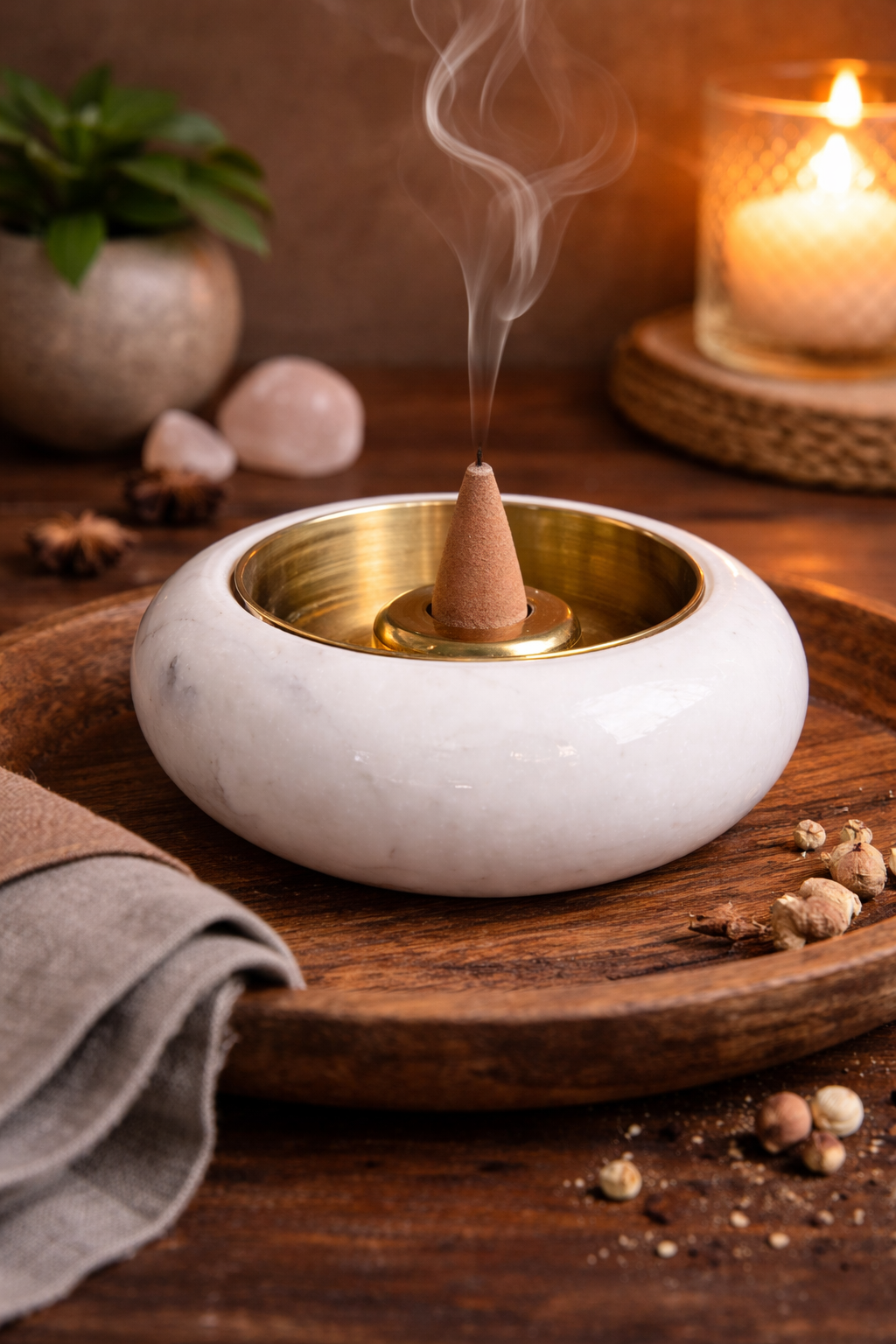 Round marble incense holder with brass on wooden table, serene meditation décor NZ