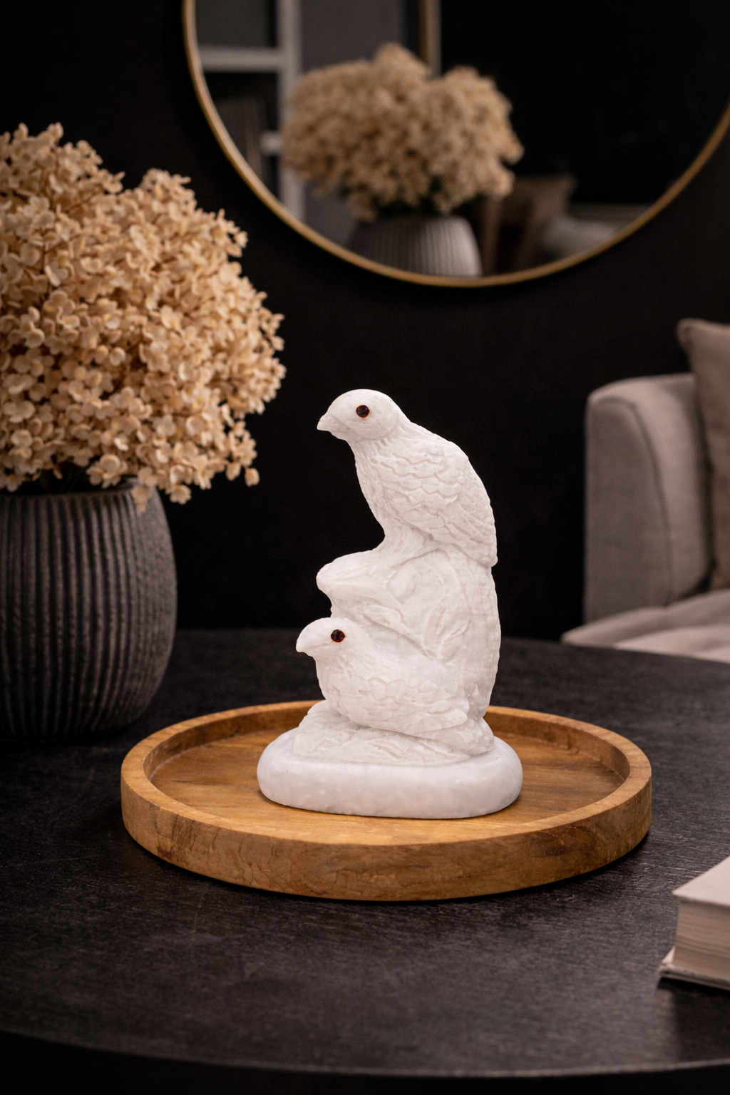 Hand-carved white marble bird sculpture displayed on wooden tray in modern living room – luxury home décor NZ