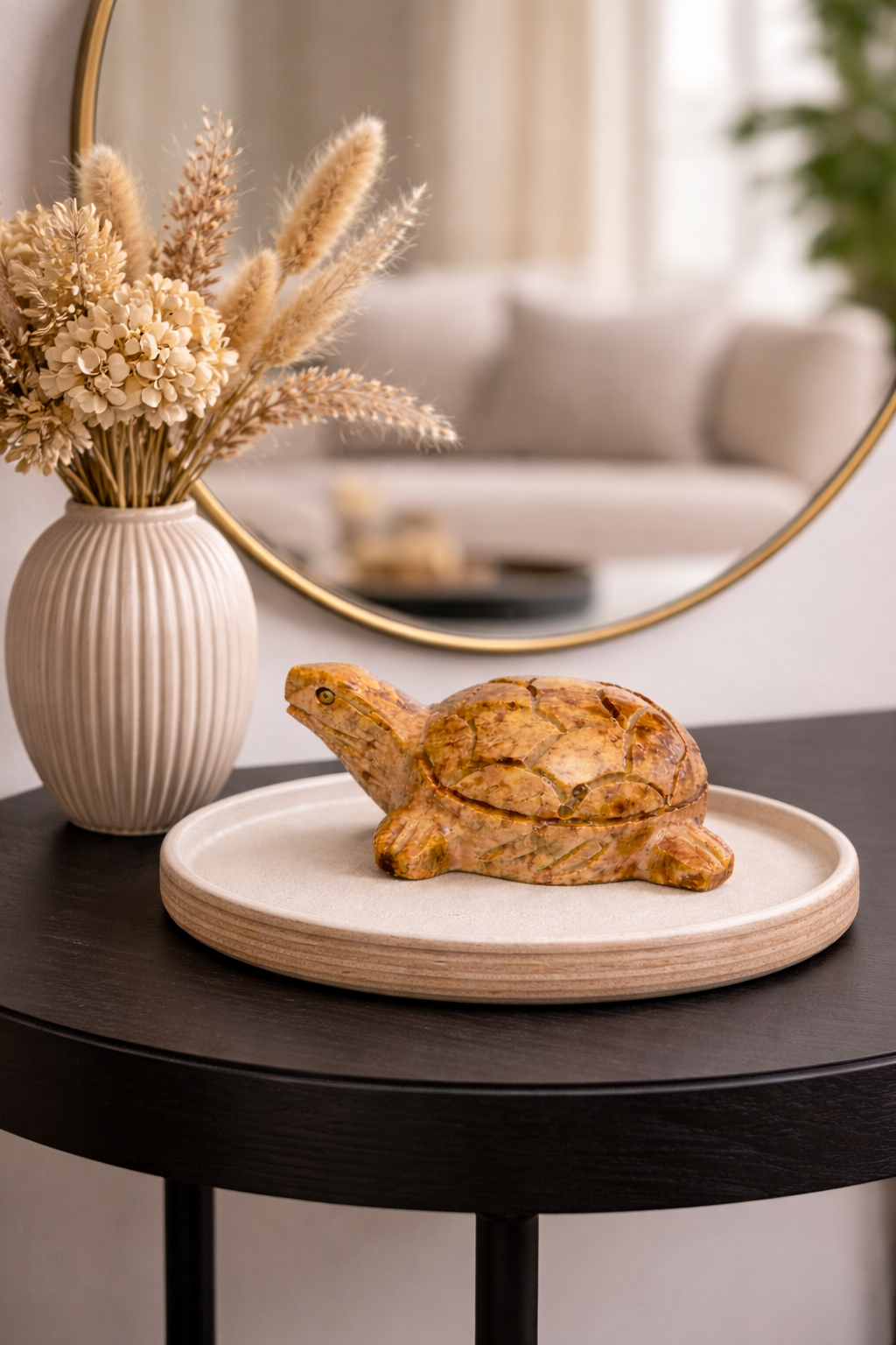 Hand-carved polished soapstone turtle sculpture displayed on decorative tray in NZ living room setting