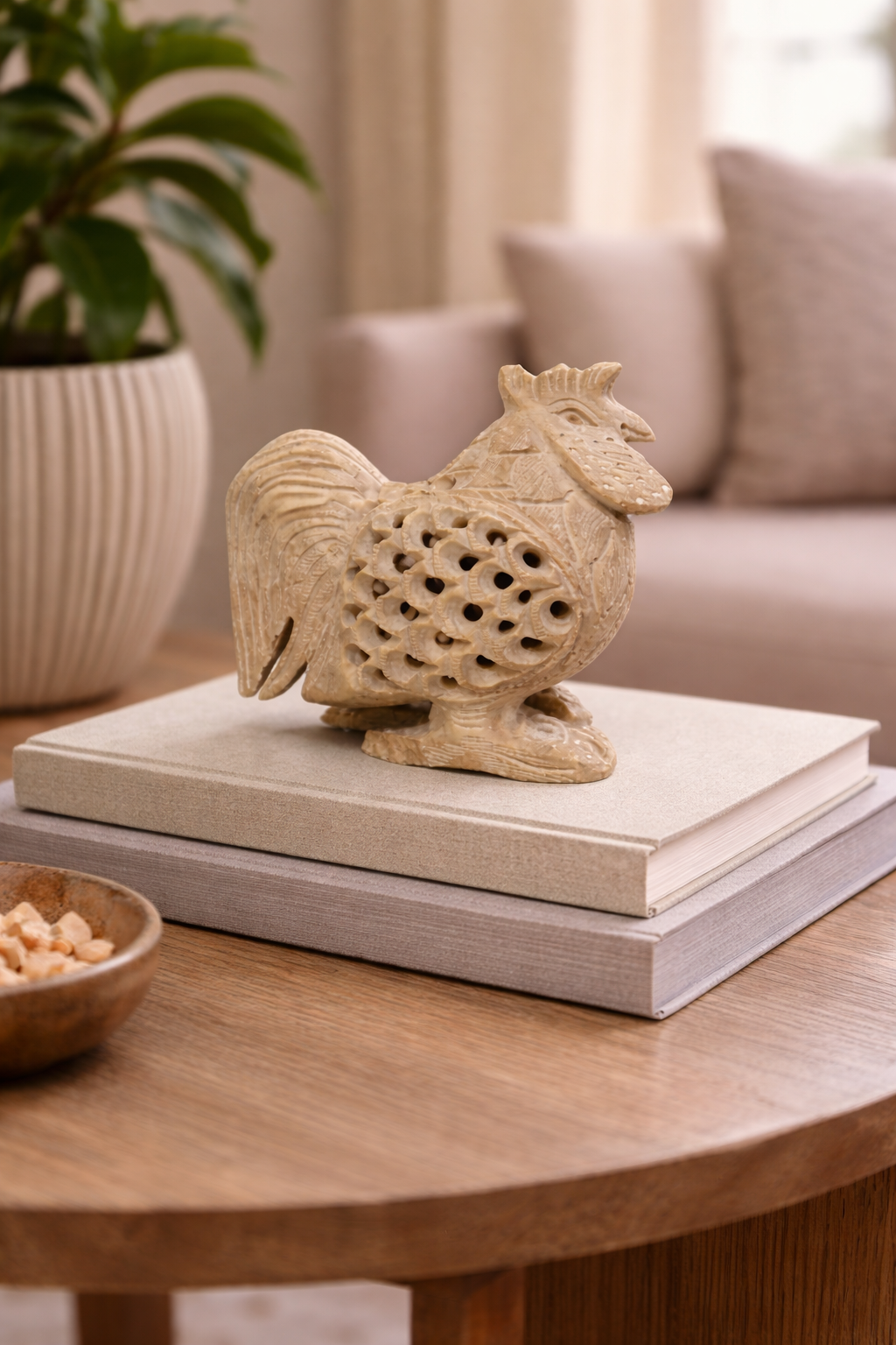 Soapstone rooster figurine with openwork carving displayed in living room