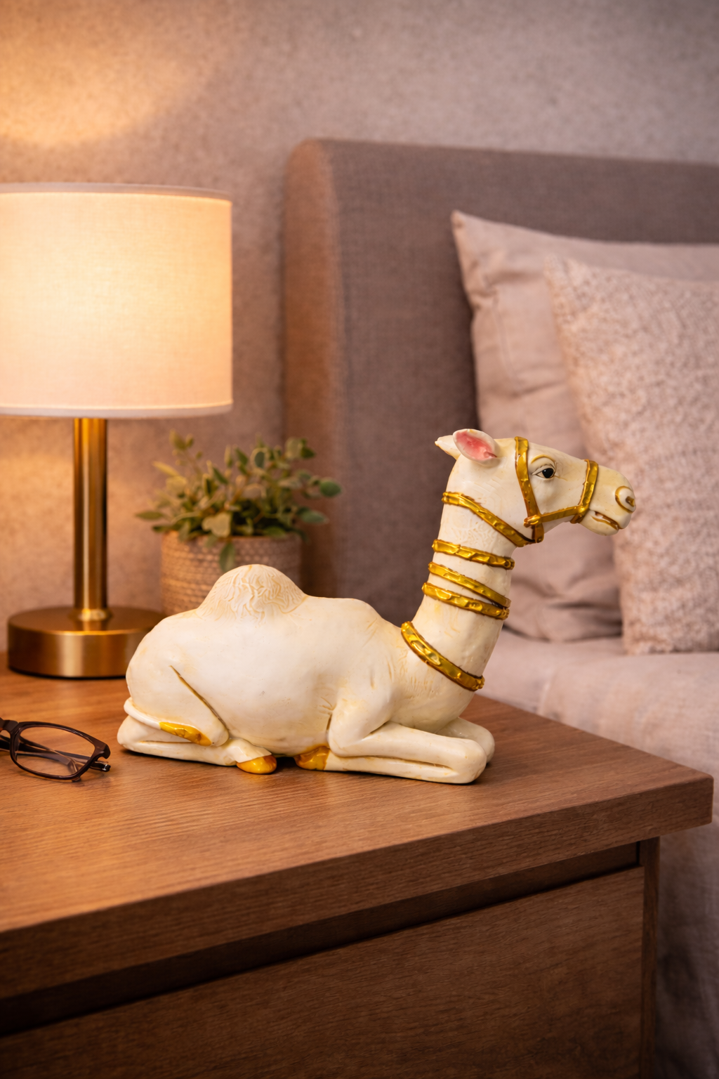 Camel décor figurine on bedside table