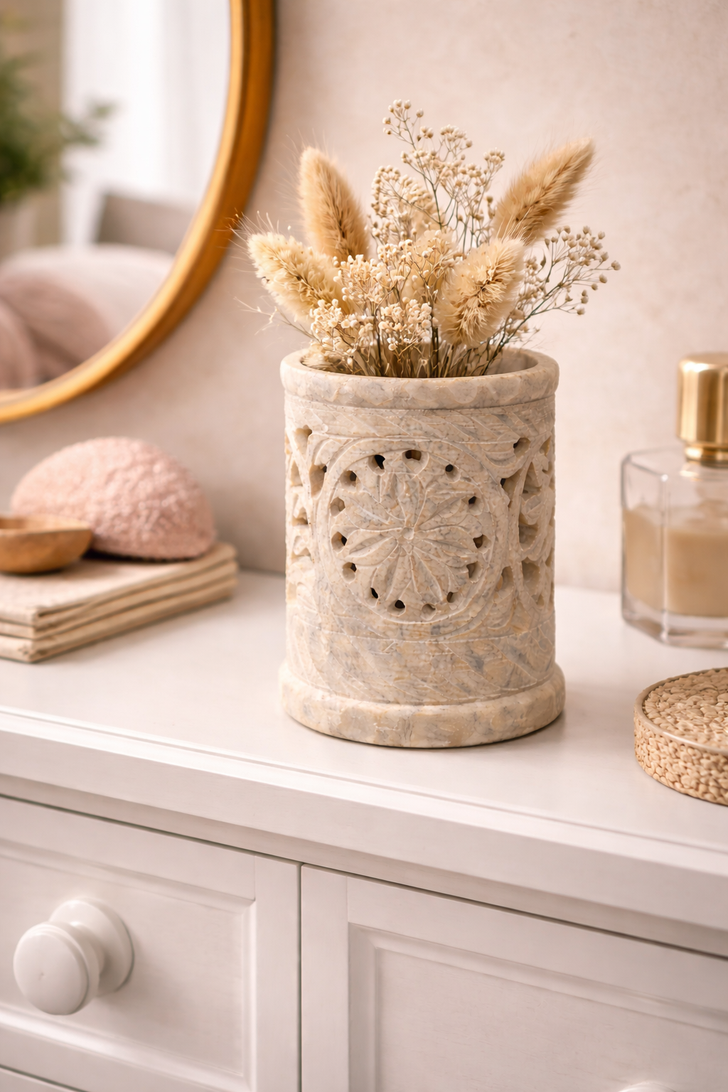 Artisan soapstone floral stand styled as a small stone flower vase