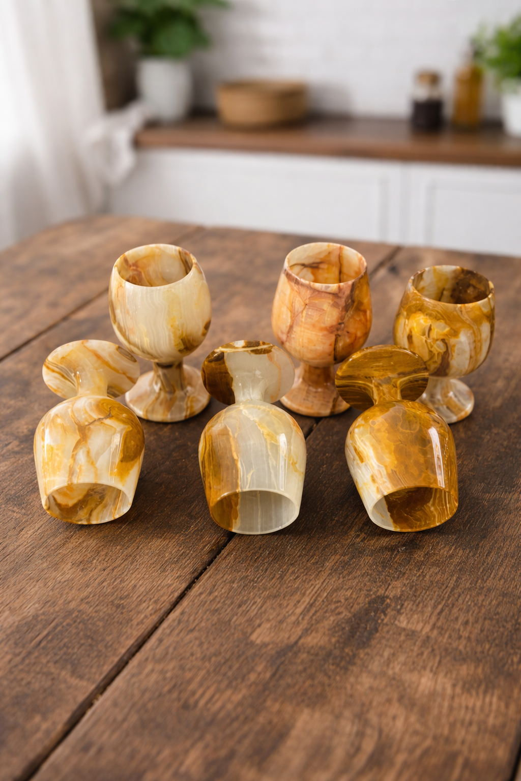 Natural onyx wine glasses displayed on table