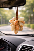 Small natural onyx grapes ornament hanging inside car