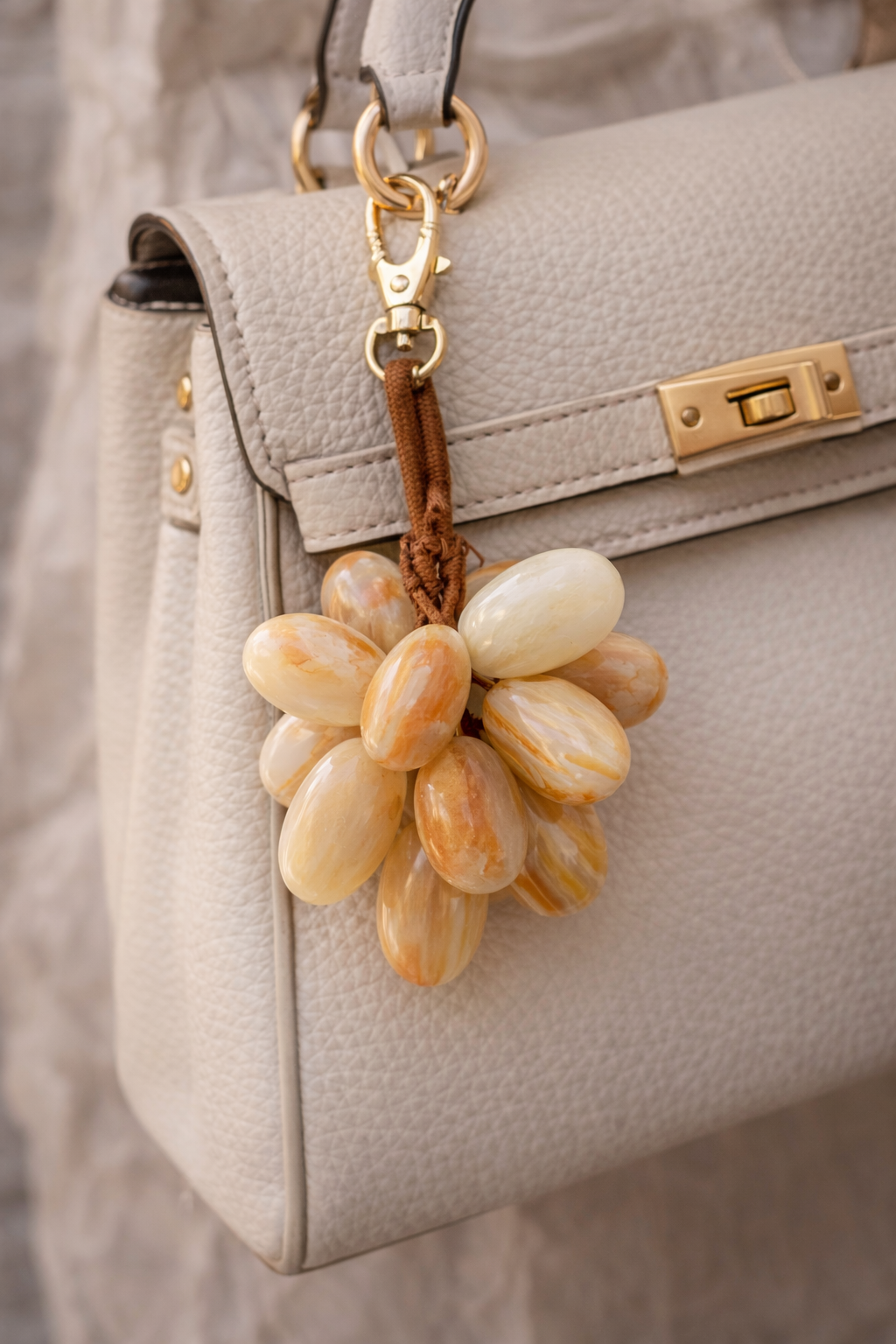 Compact natural onyx grapes decor attached as decorative purse accent