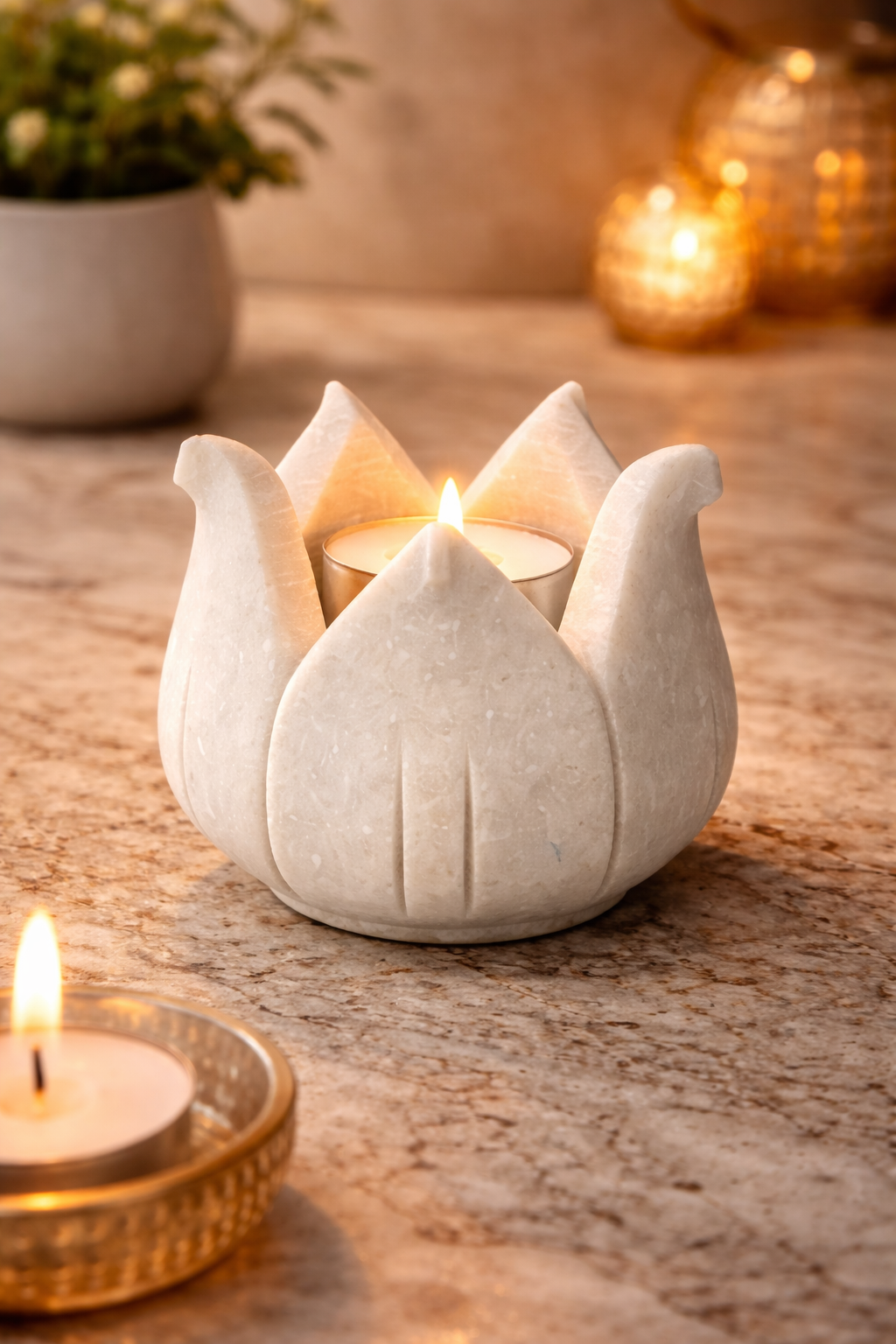 Marble lotus candle holder creating warm ambient lighting