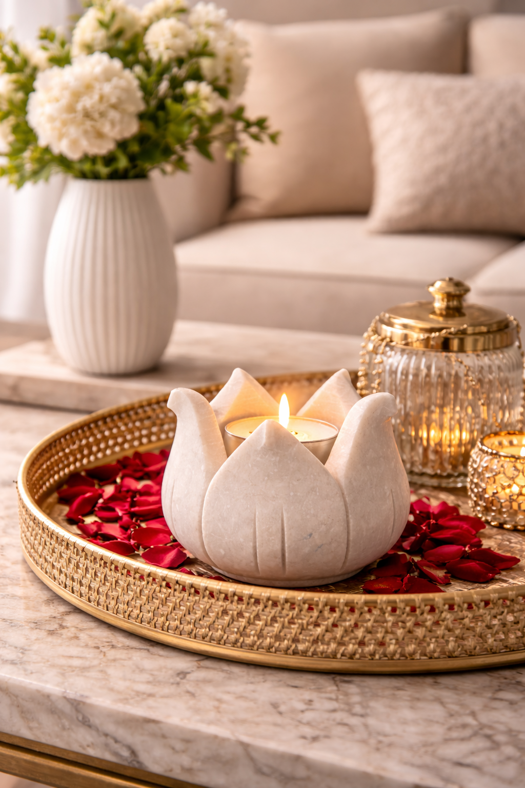 Hand-carved marble lotus bowl styled as a living room centrepiece with candle