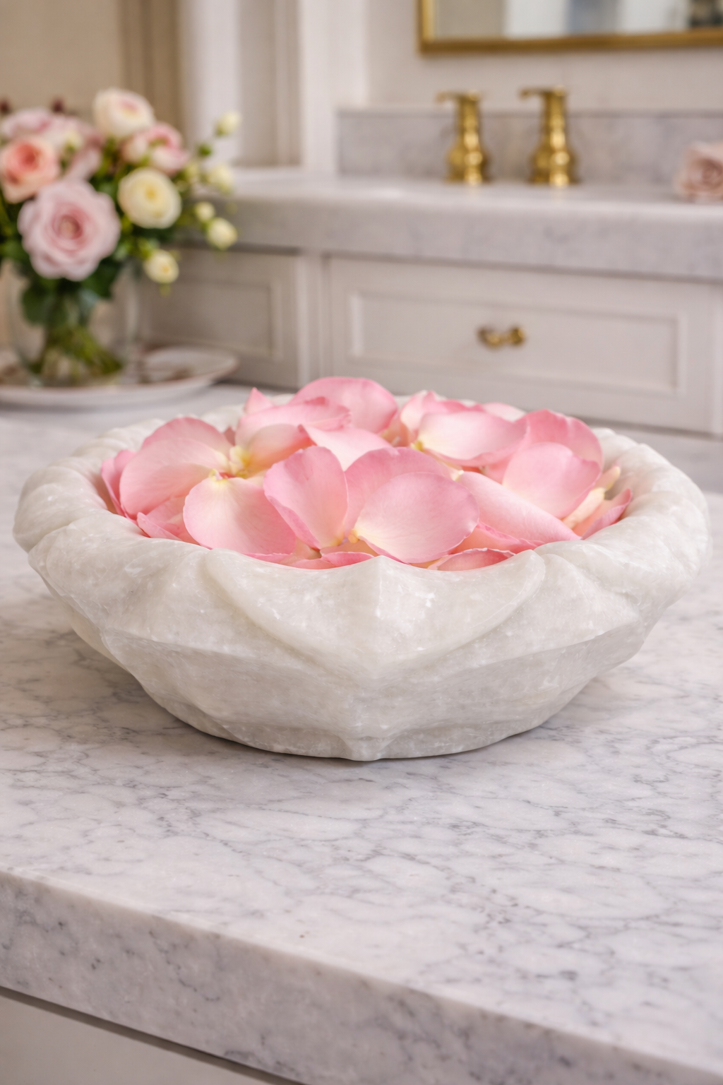Luxury hand-carved marble lotus decorative bowl with floating rose petals in wellness setting