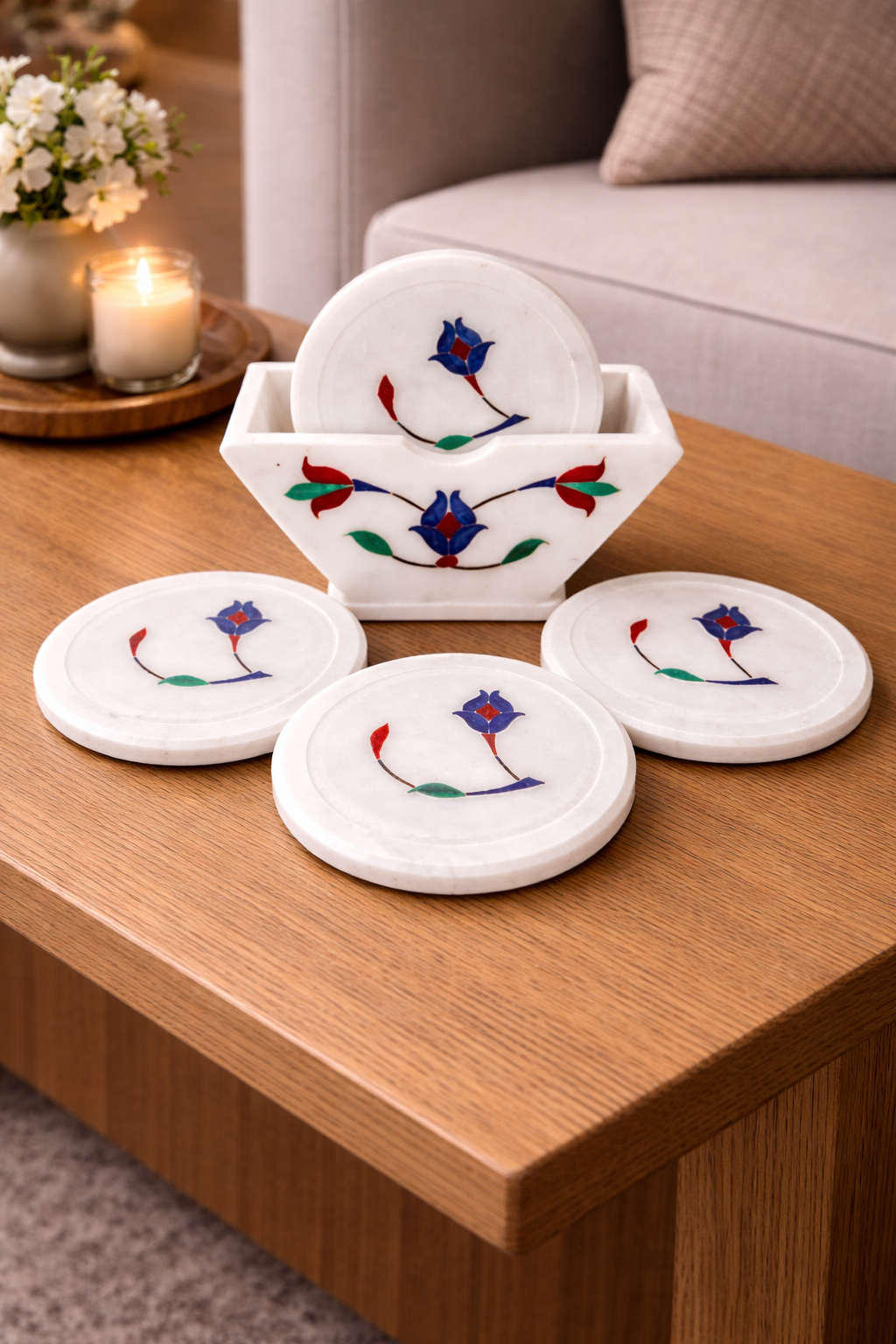 Luxury white marble coaster set with floral pietra dura inlay and marble holder on wooden coffee table