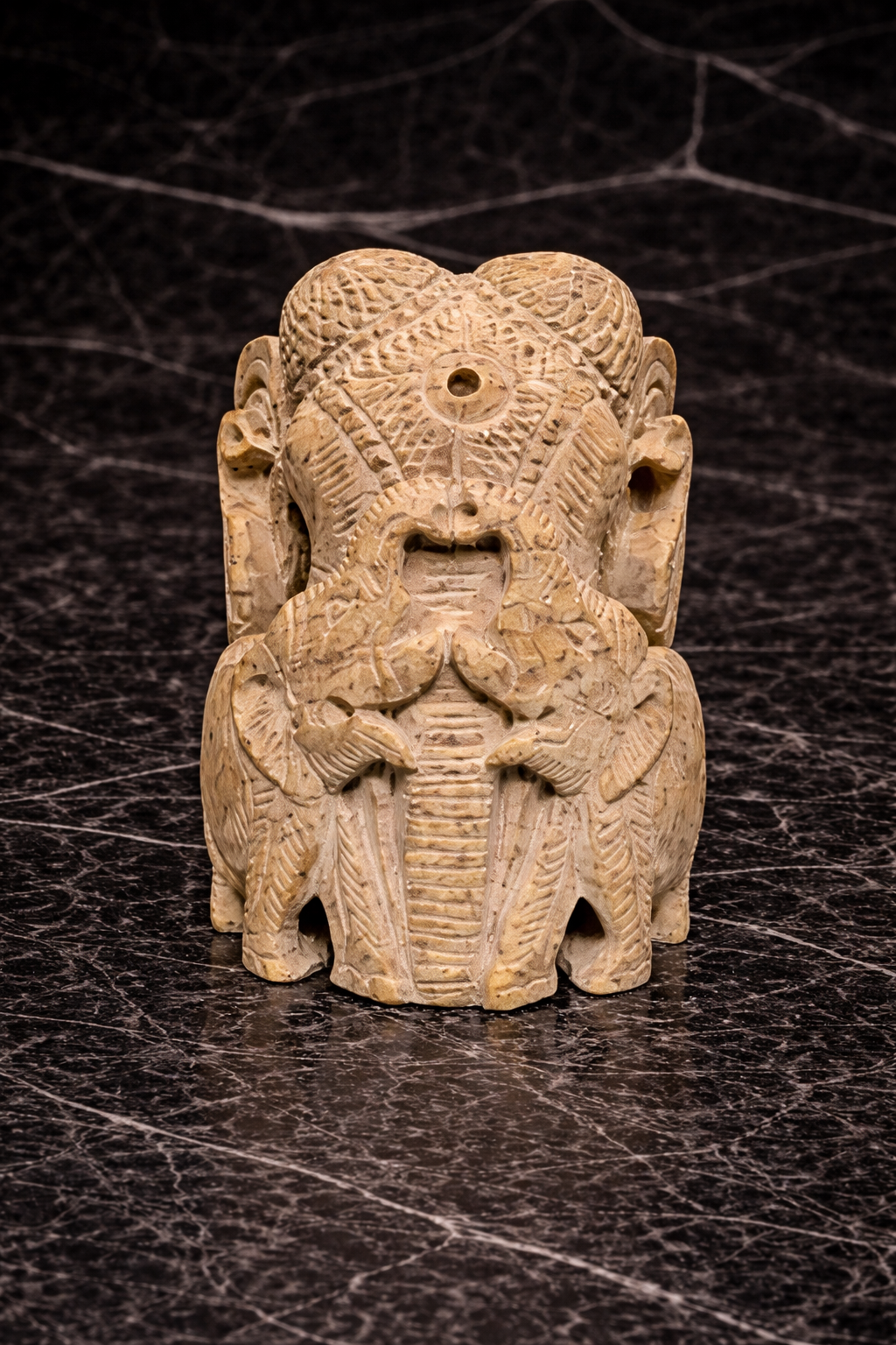 Front view for Soapstone elephant family sculpture