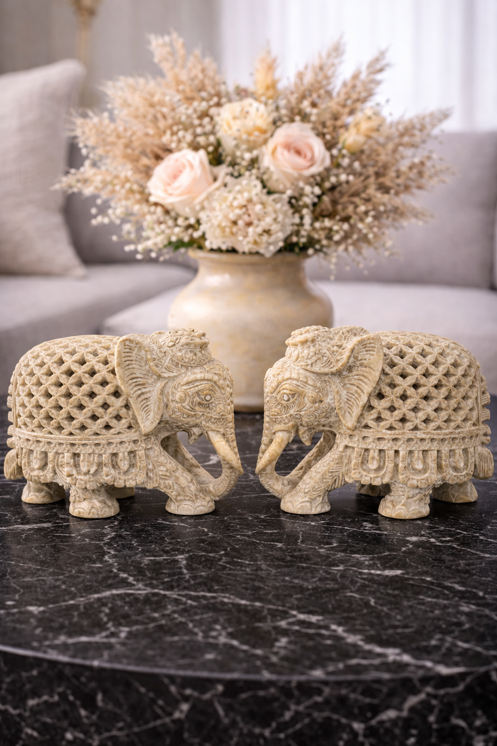 Handcrafted soapstone elephant sculpture symbol of protection and unity styled in bright living space