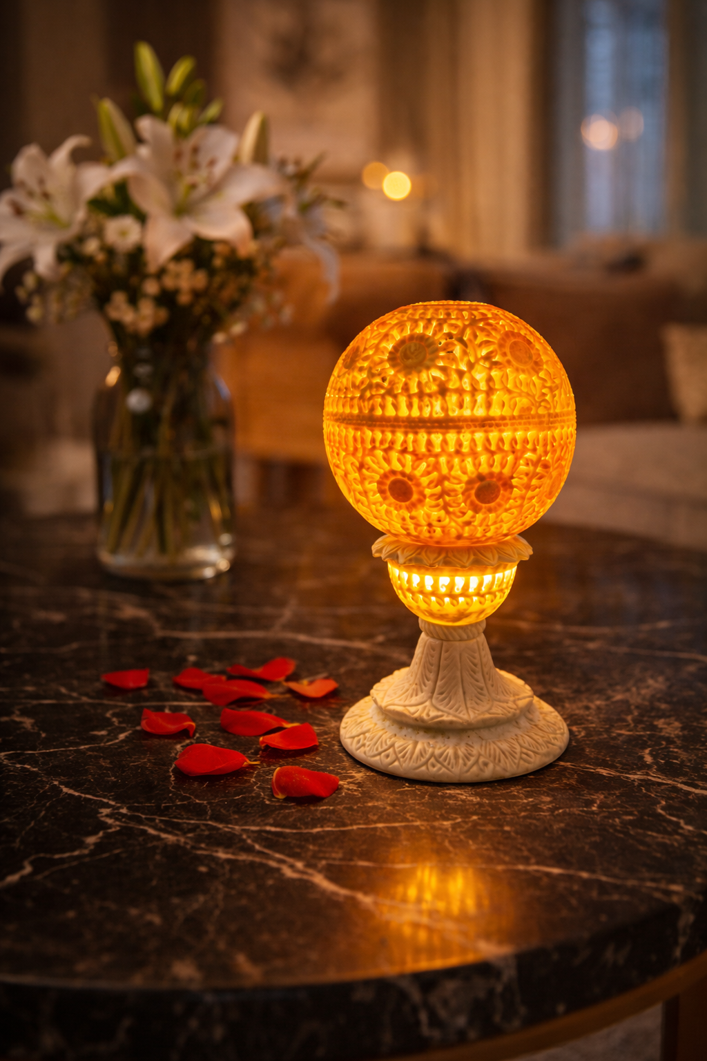 Hand-carved stone tealight holder glowing gently on side table