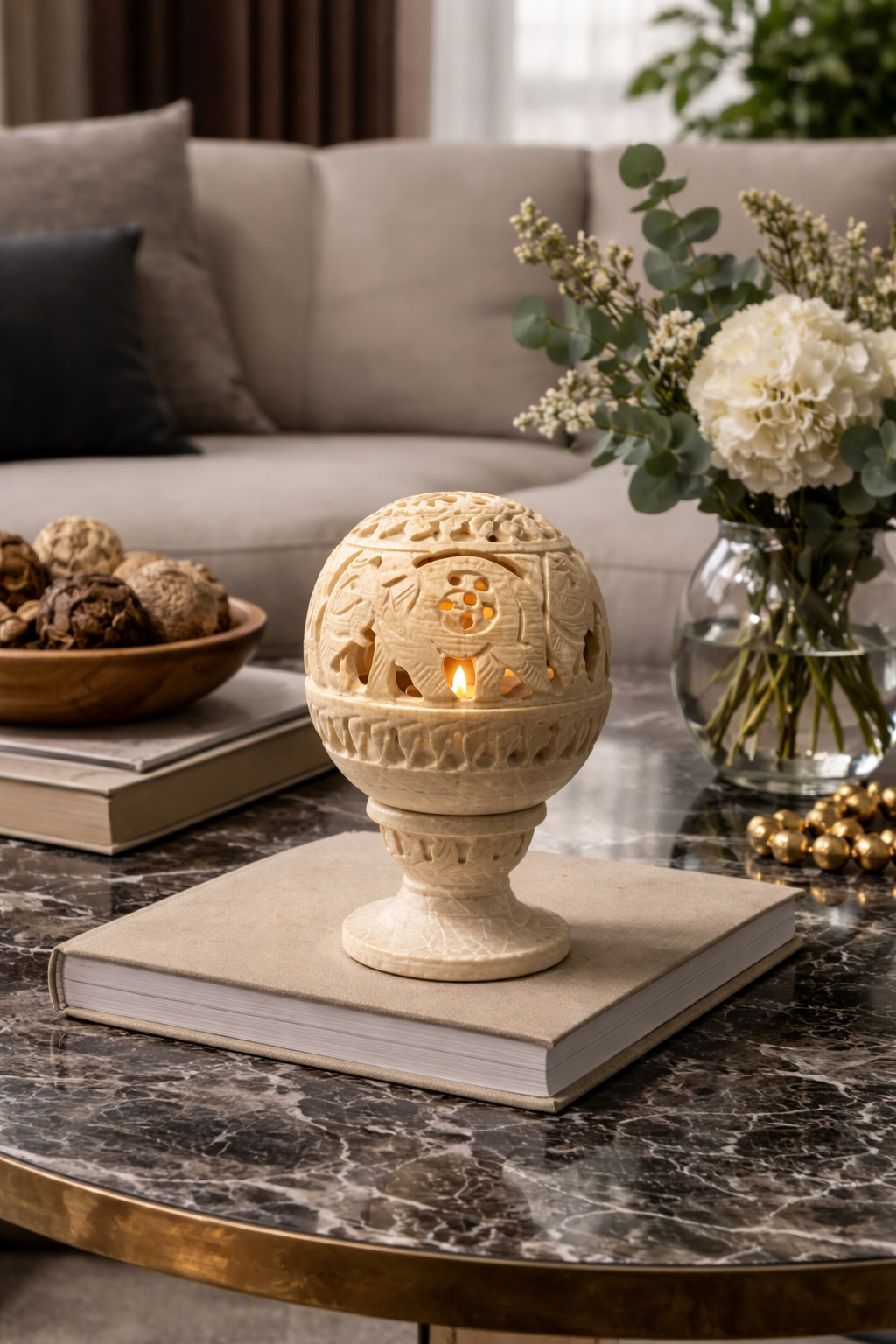 Soapstone elephant tealight holder used as centrepiece on living room table