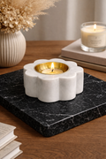 Luxury round lotus marble tealight holder styled on black tray in modern home decor setting NZ
