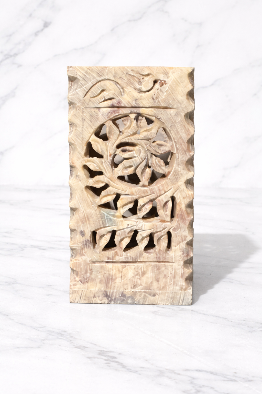Hand-carved soapstone holder with floral cut-out design