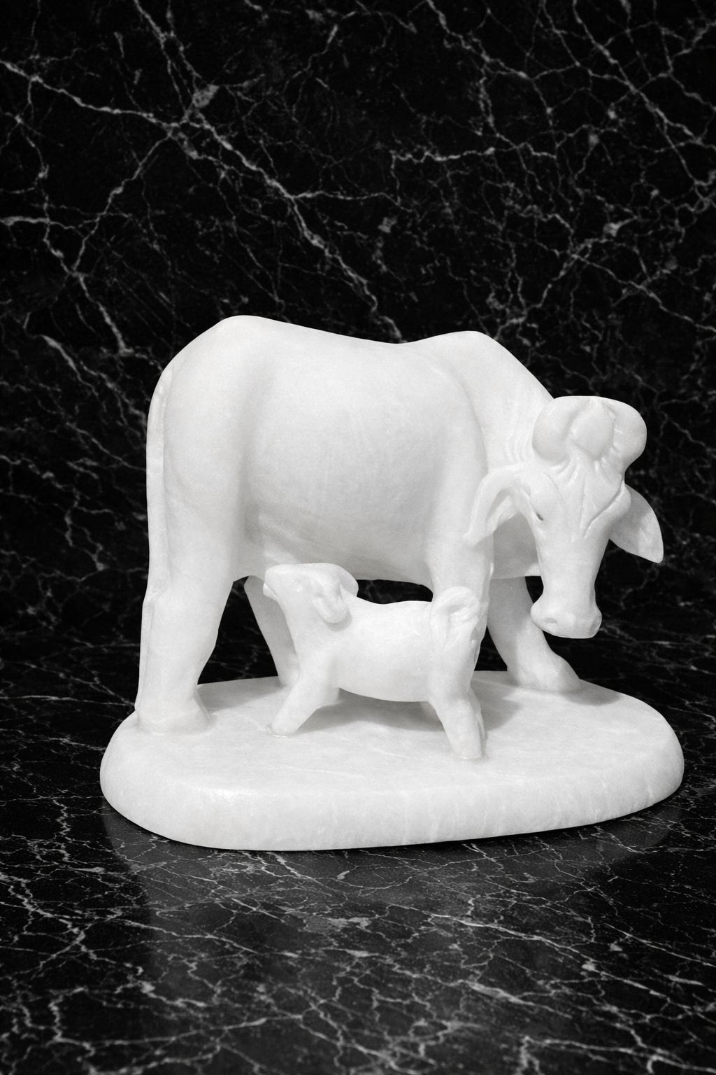 white marble cow calf statue symbol of love and nurturing home decor