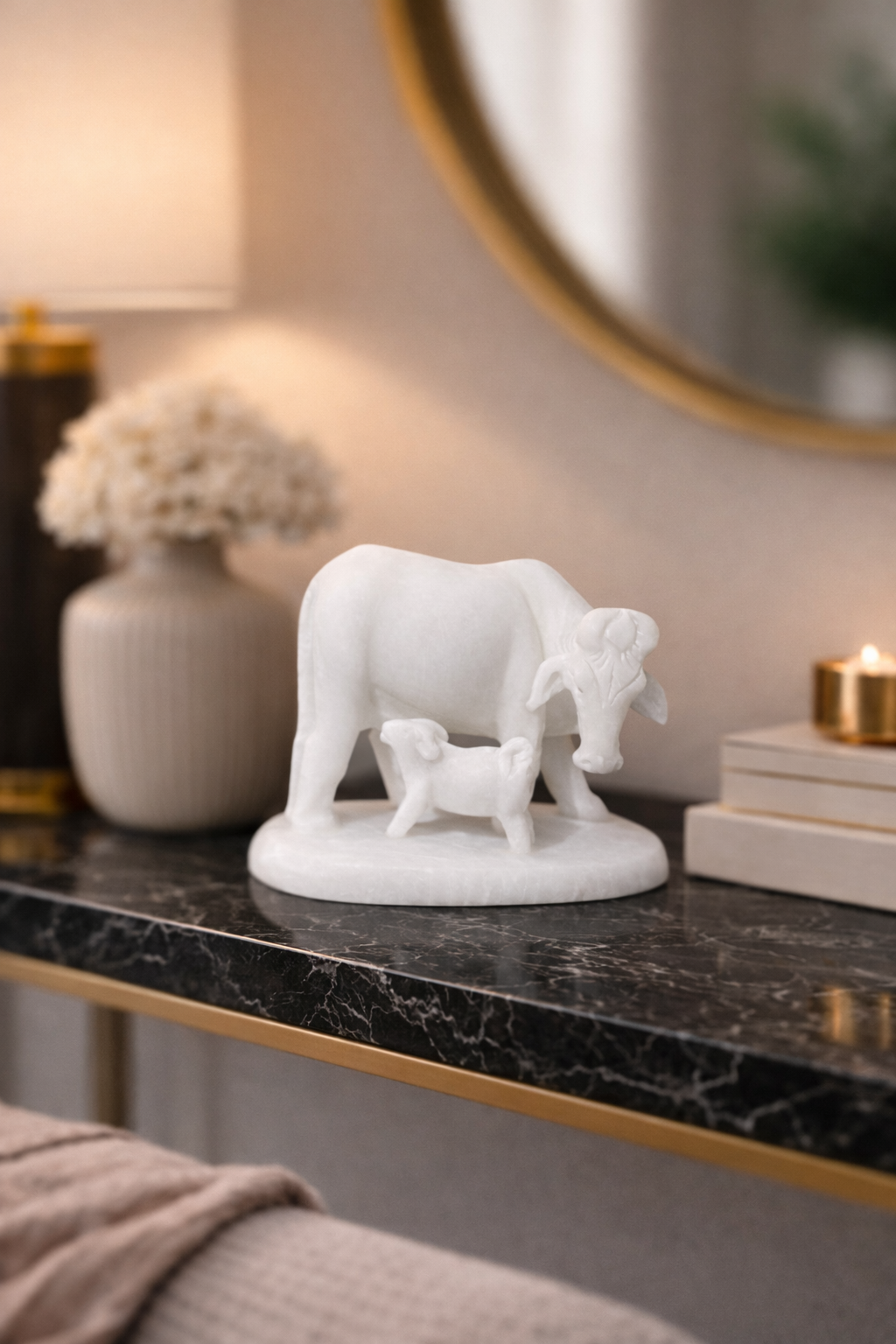 white marble cow and calf statue on black marble console table luxury home decor nz