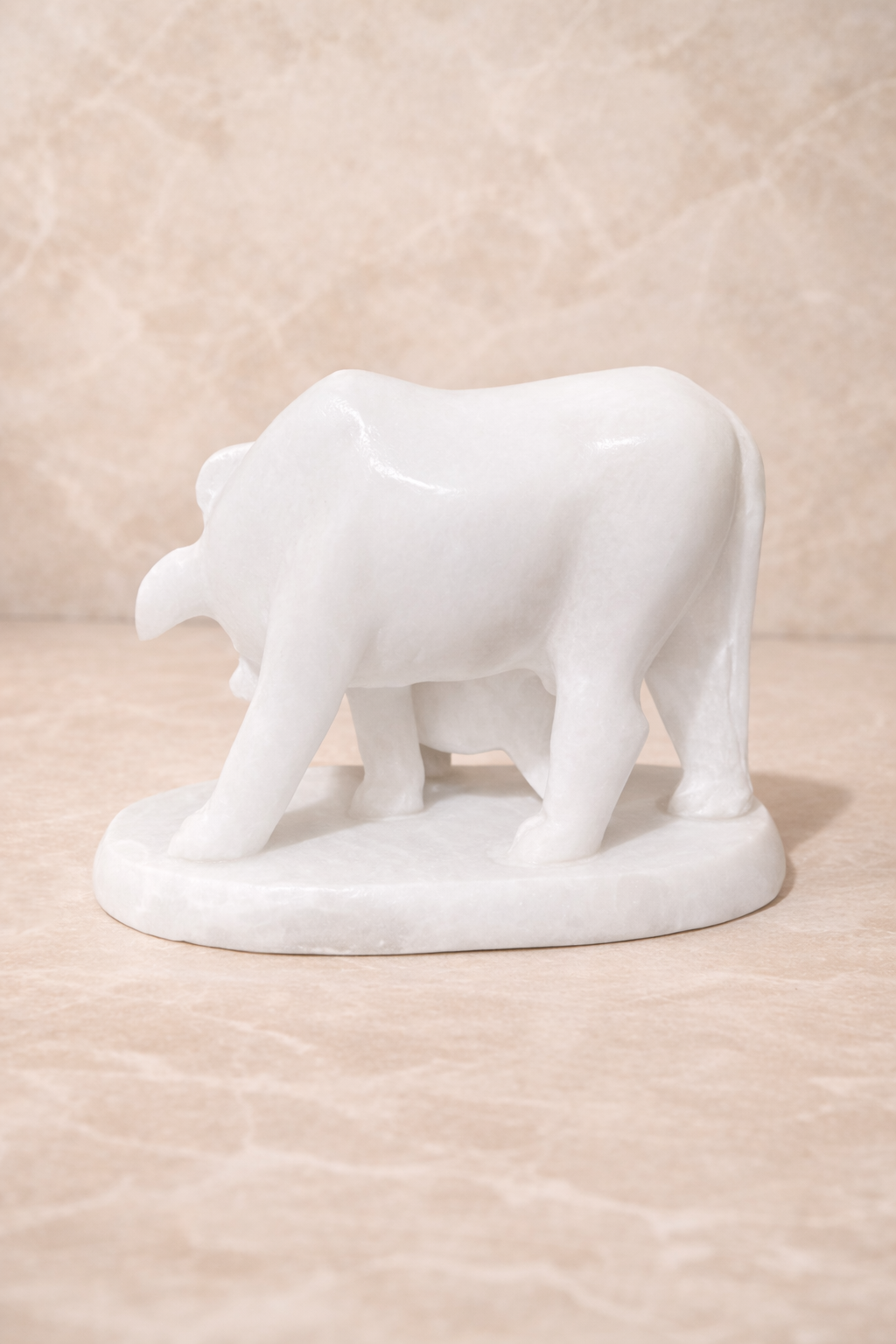 Rare view of natural marble cow calf sculpture luxury interior decor