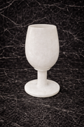 White marble wine glass decor on dark marble surface – hand-carved stone goblet NZ