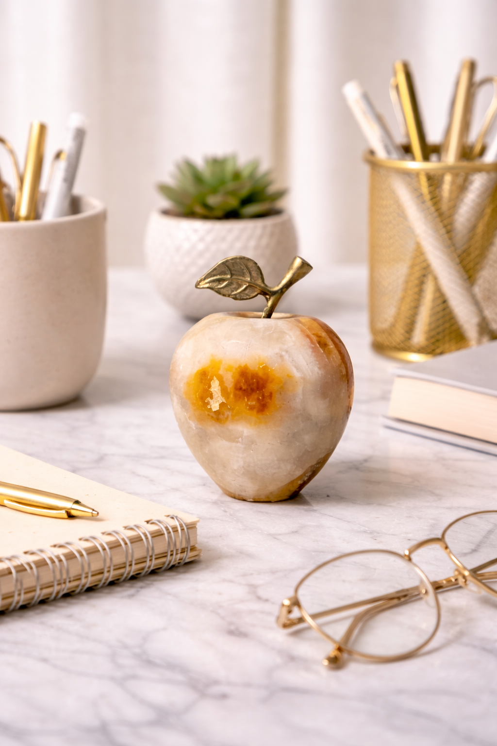Onyx apple decor on an office desk