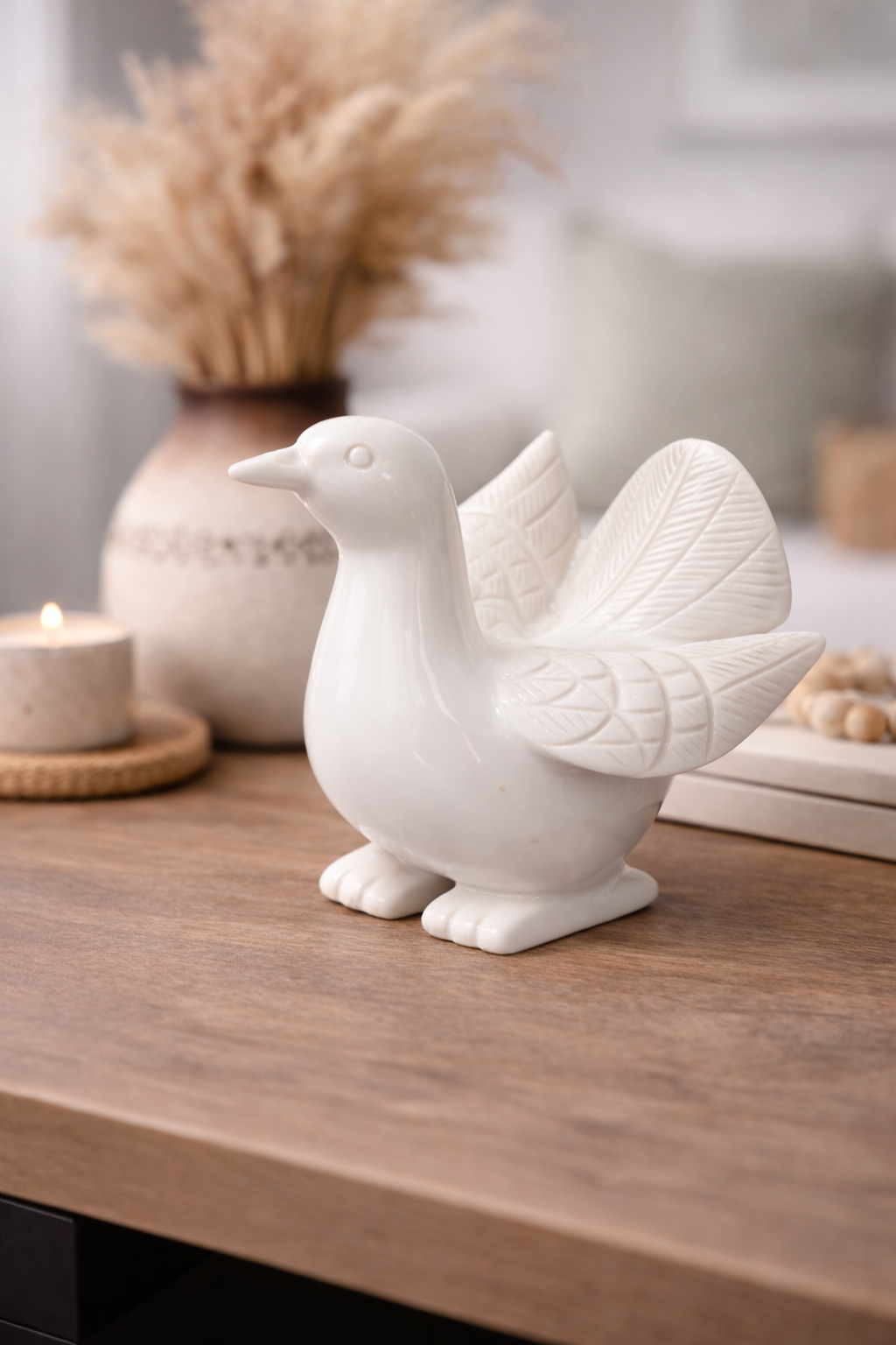 White marble dove statue styled on console table NZ