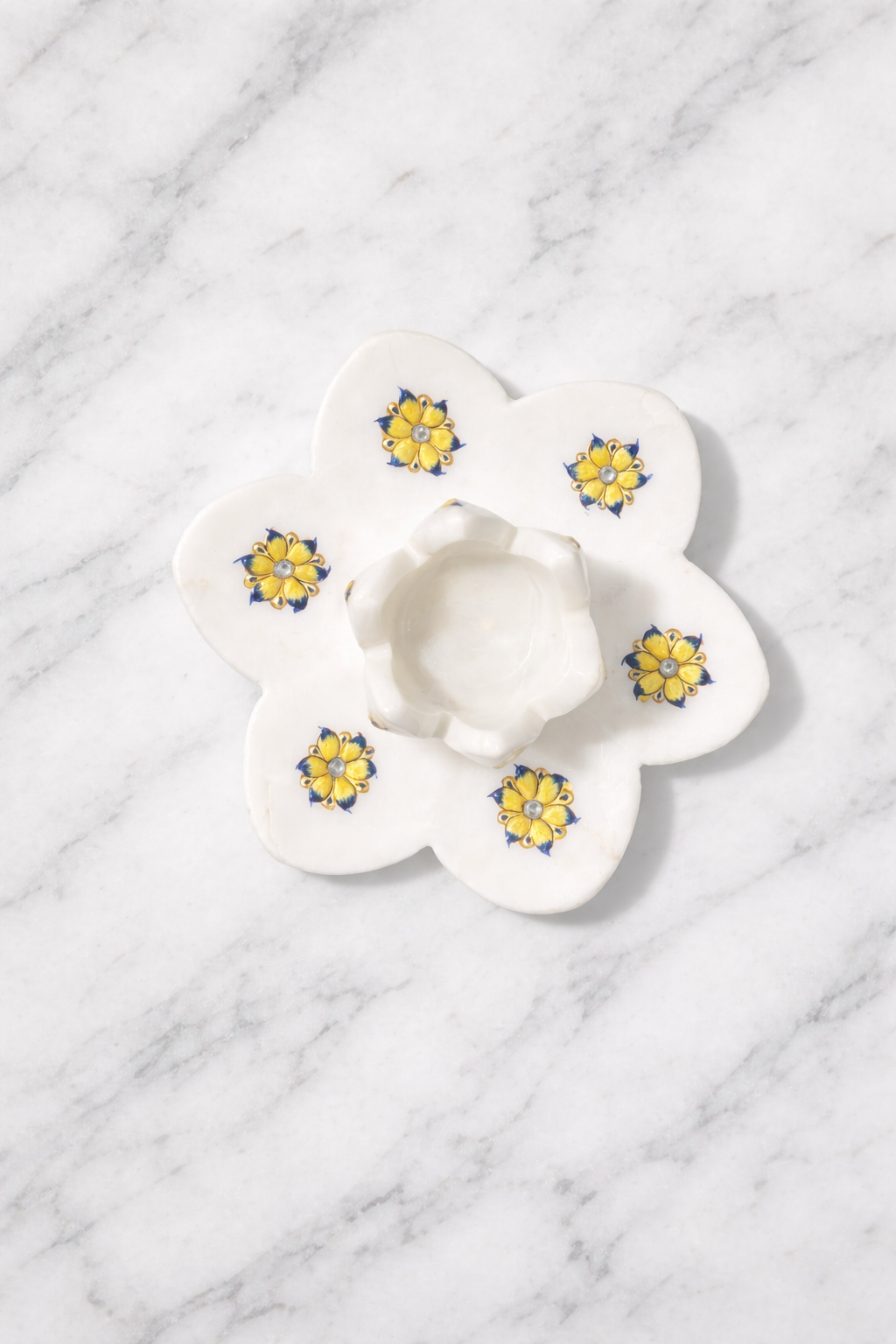 White marble lotus candle holder with hand-painted floral detailing