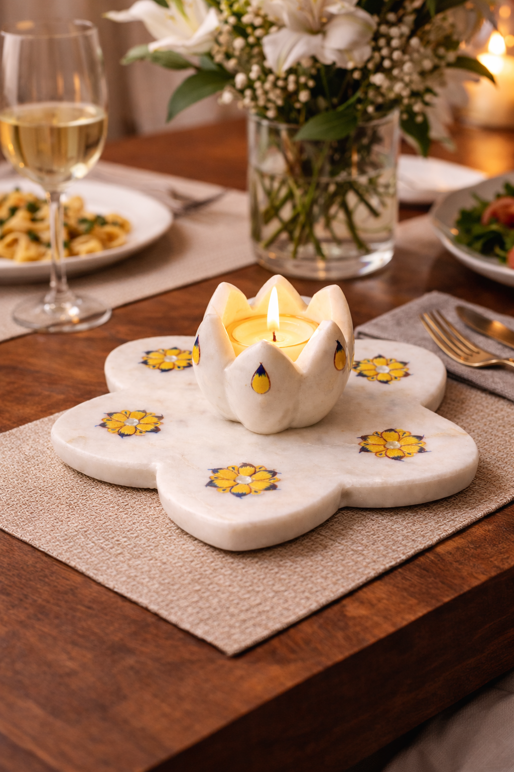 Hand-painted marble lotus tealight holder styled for premium dining table decor NZ