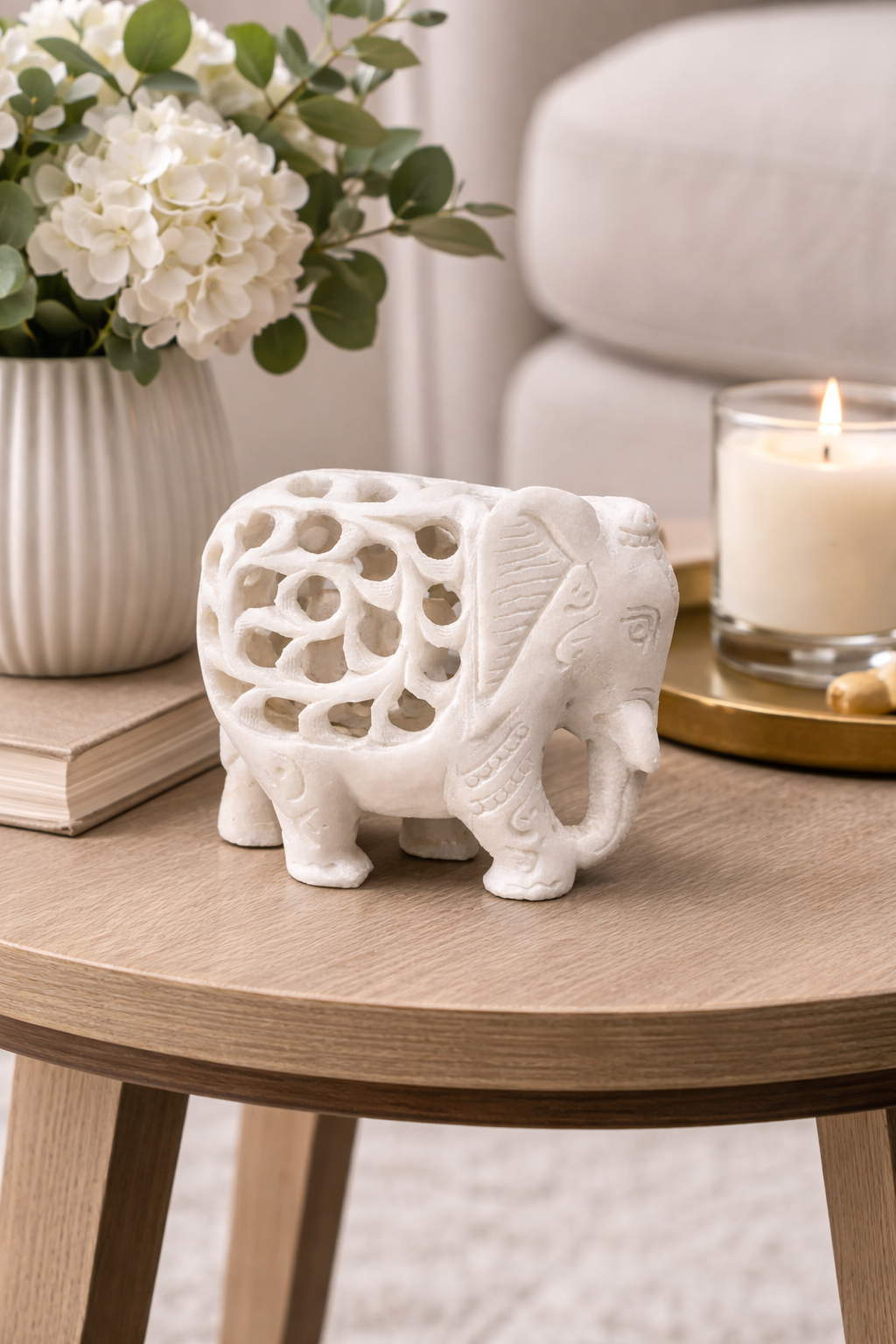Hand-carved solid marble elephant with baby used as living room decor