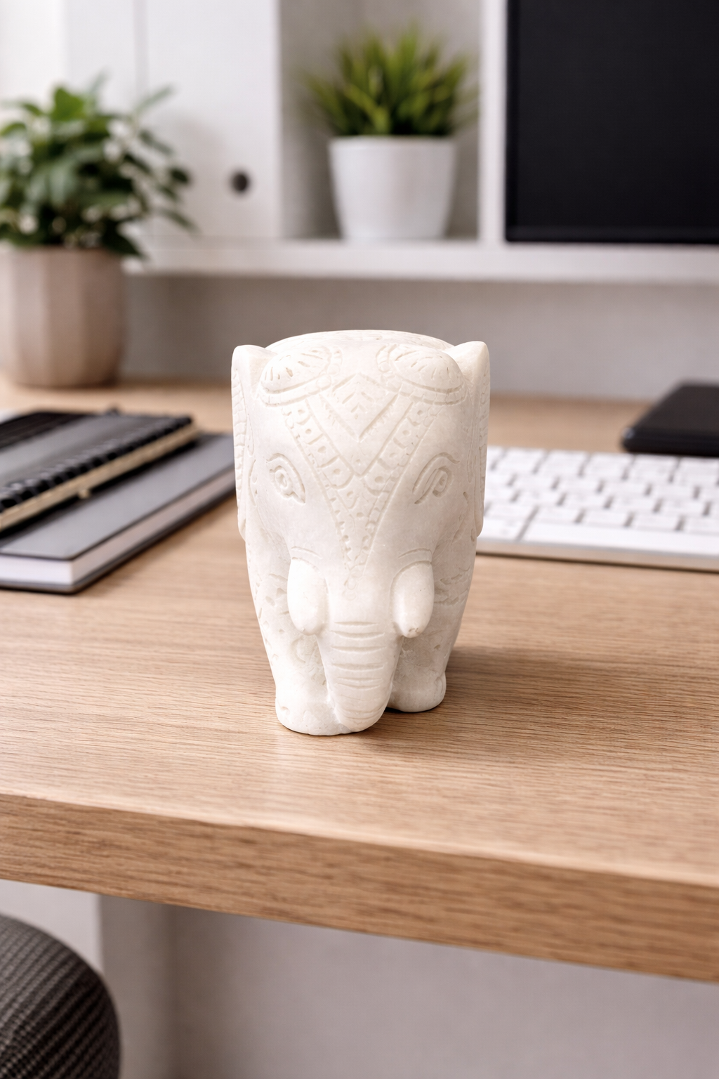 Hand-carved solid marble elephant with baby used as executive desk decor