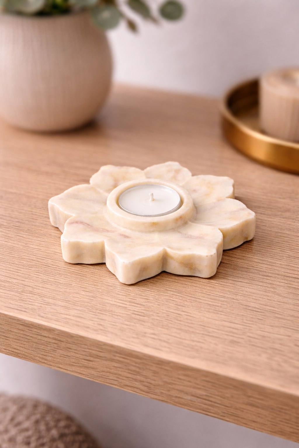 White marble flower shaped tealight holder carved from solid natural stone